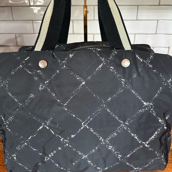 CHANEL Black Quilted Travel Bag with Diamond Pattern - Picture 16 of 16